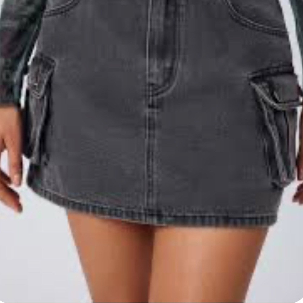 Black denim Mini Cargo Skirt. Size medium multi pockets.